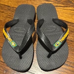 Havaianas Black and Yellow Flip Flops